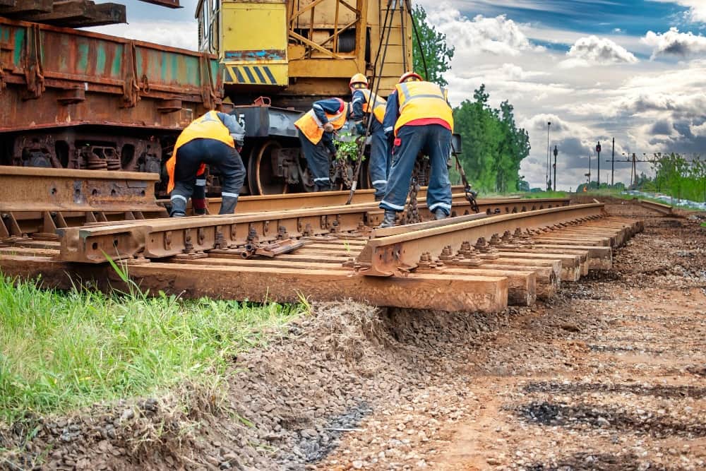 Engineers construct new tracks on a line where railway jobs pay high